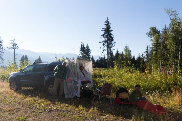 three men bivy by a truck in the valhallas